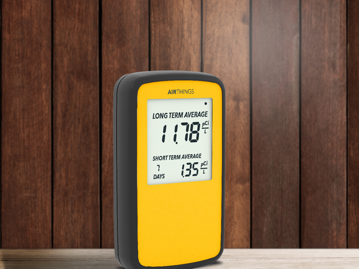 Image of orange radon testing device